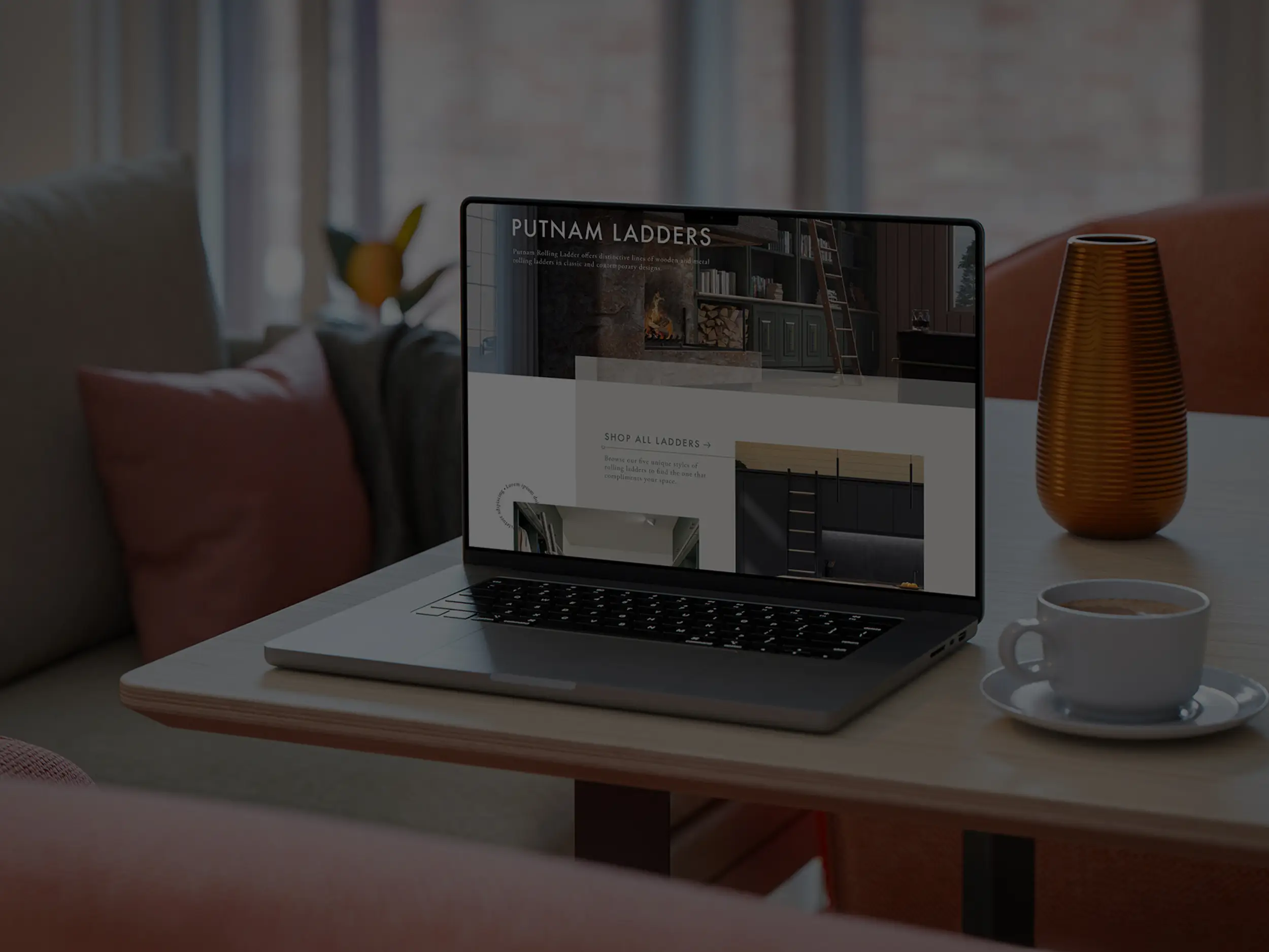 computer on desk with Putnam Ladder website