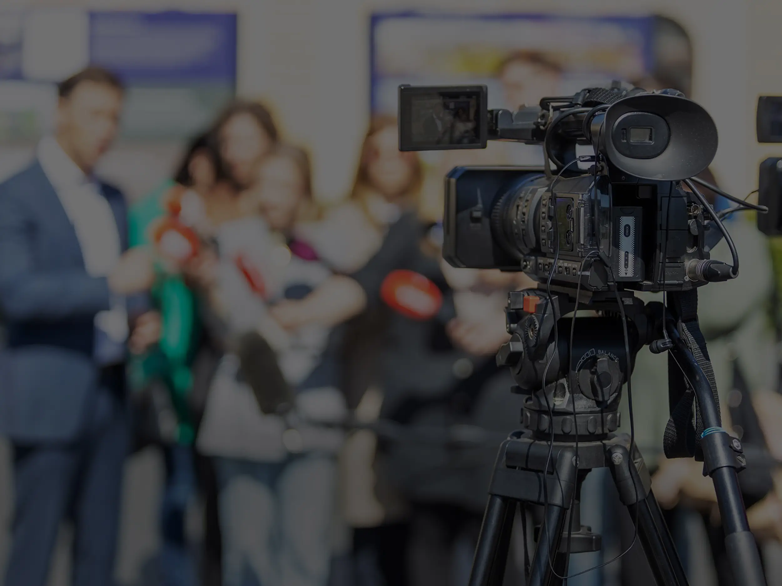 camera pointed to crowd for release