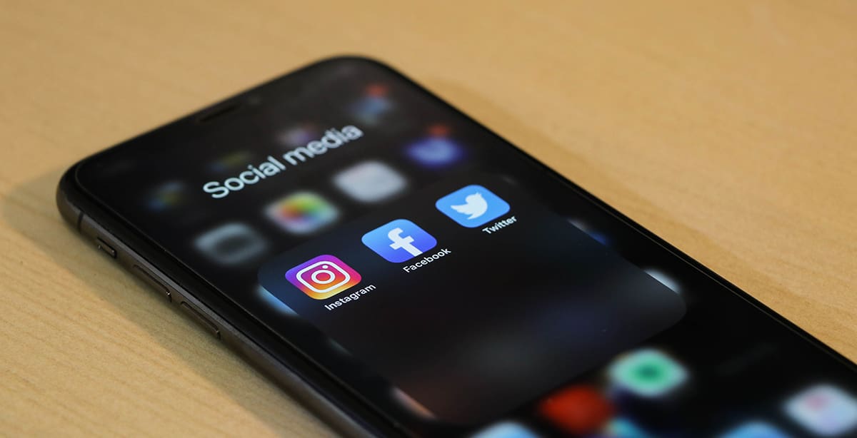 Phone with social media folder pulled up