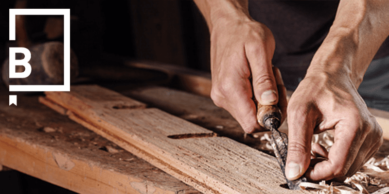 Hands working on wood