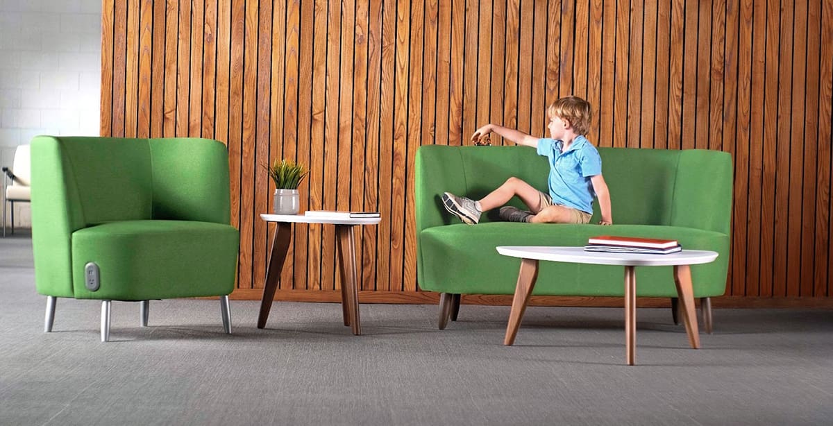 Little boy playing on couch