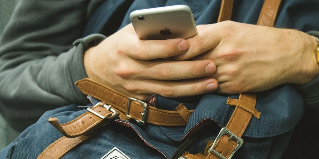 Person on their iPhone