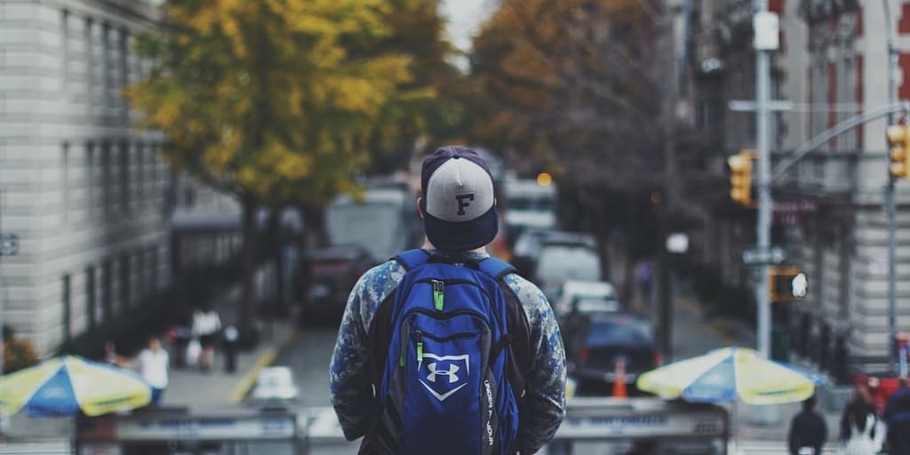 Person standing above the crowds