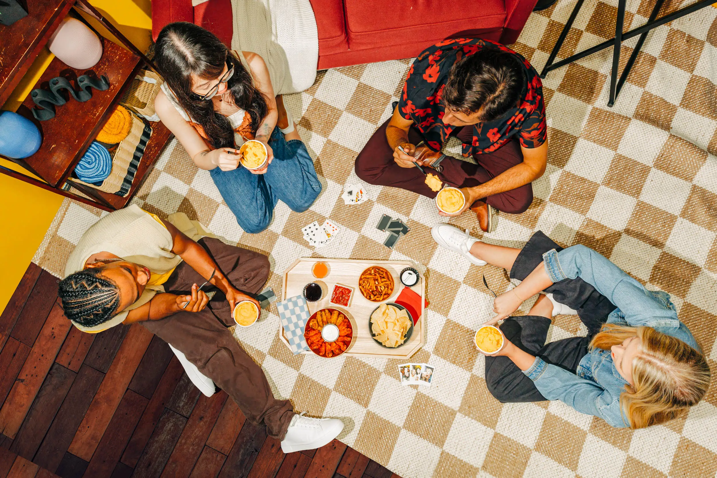 overhead of friends eating mashed potatoes