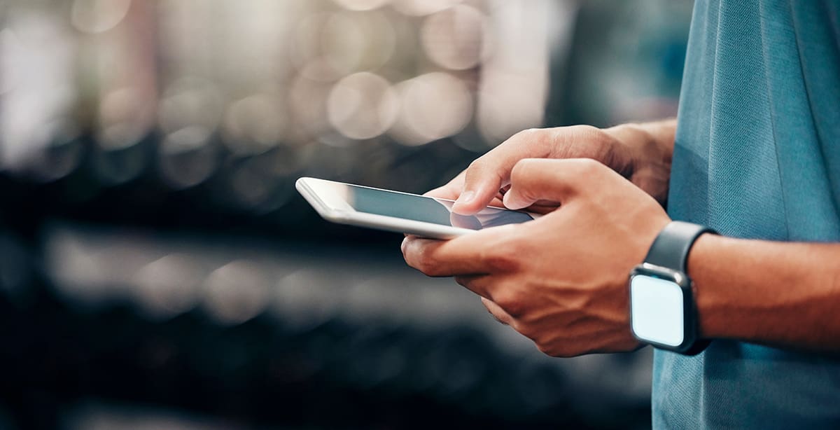 Person checking text messages on their smartphone