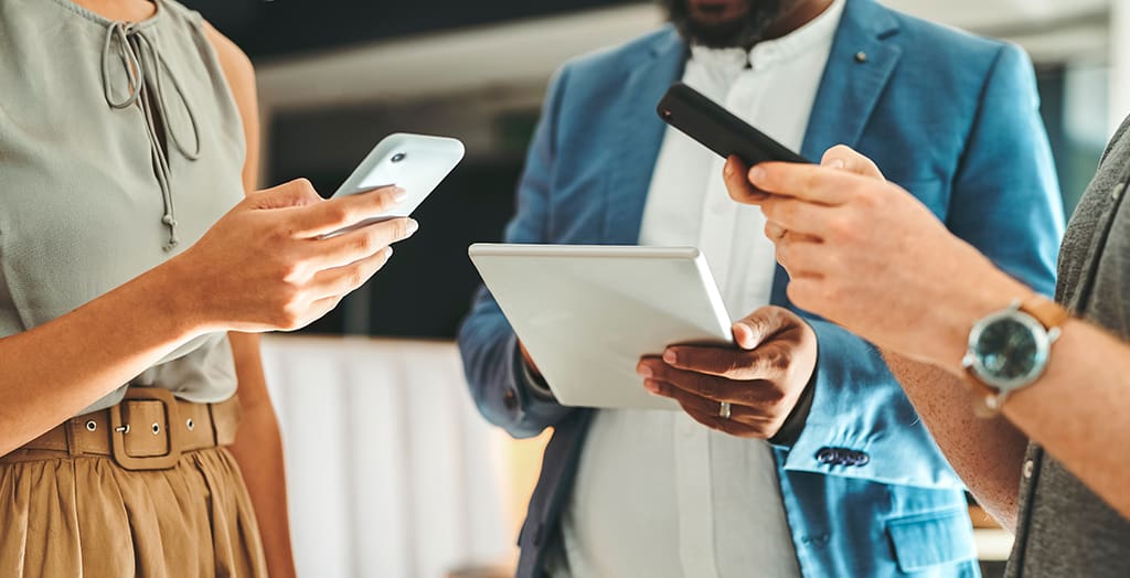 people looking at phones