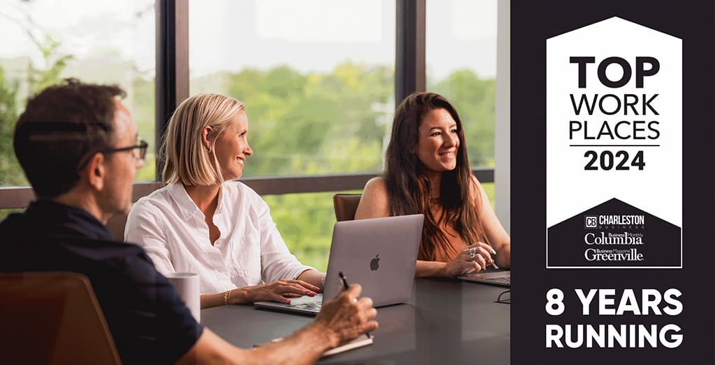 People smiling at a table