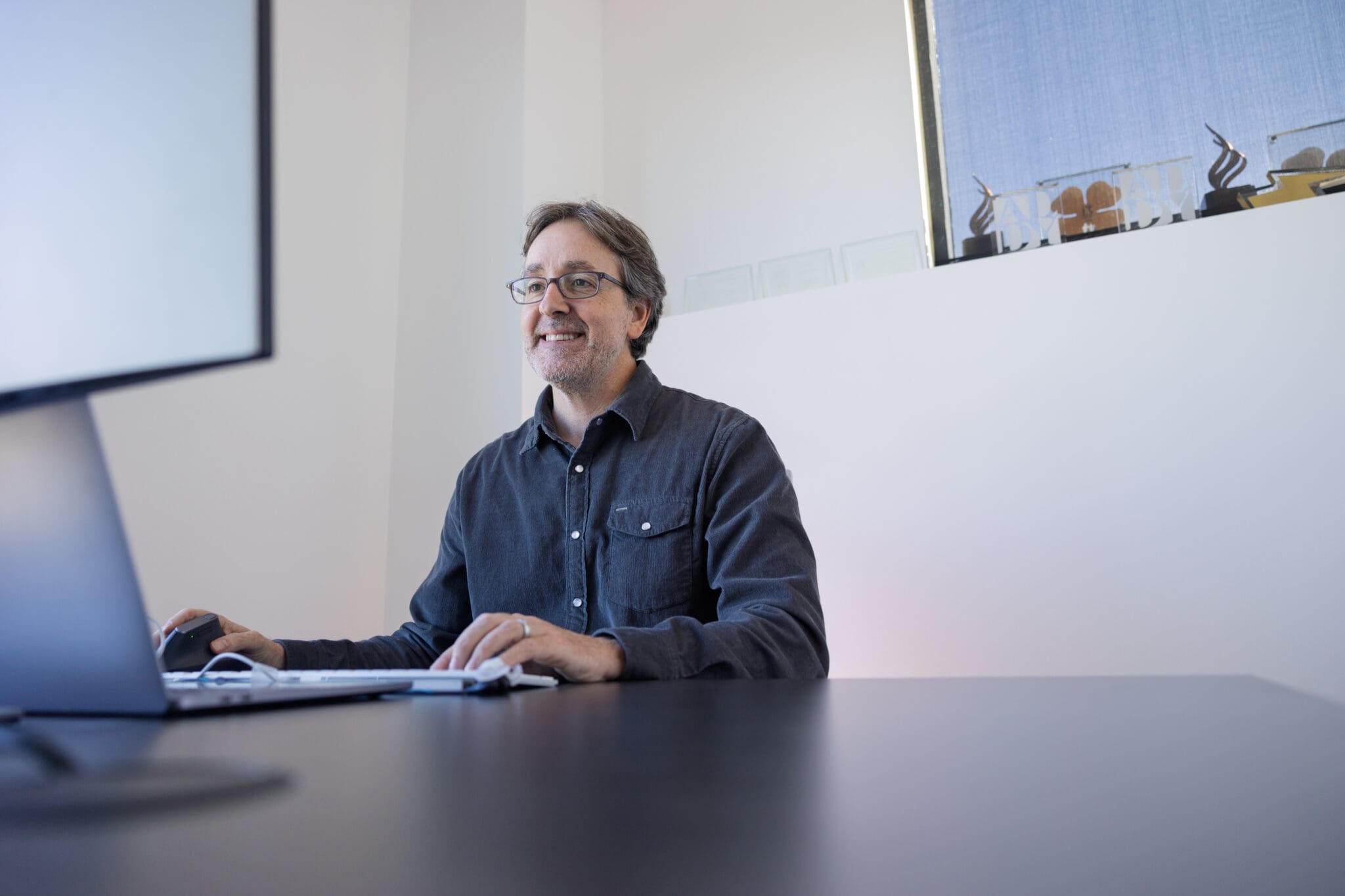 man sitting at a desk