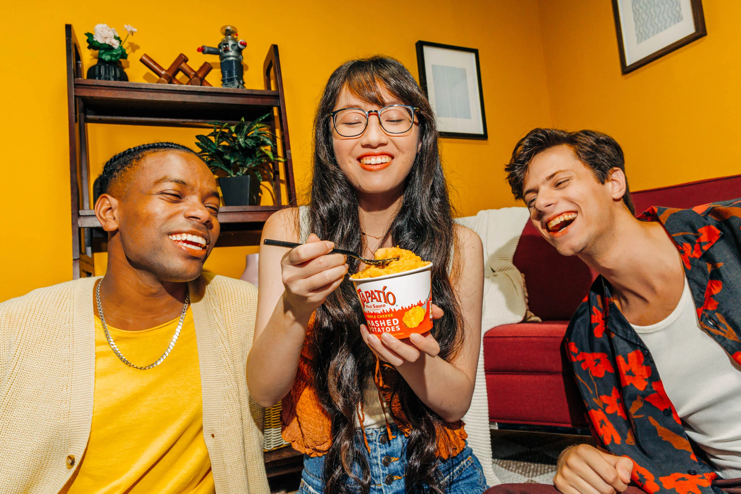girl holding potatoes in a cup