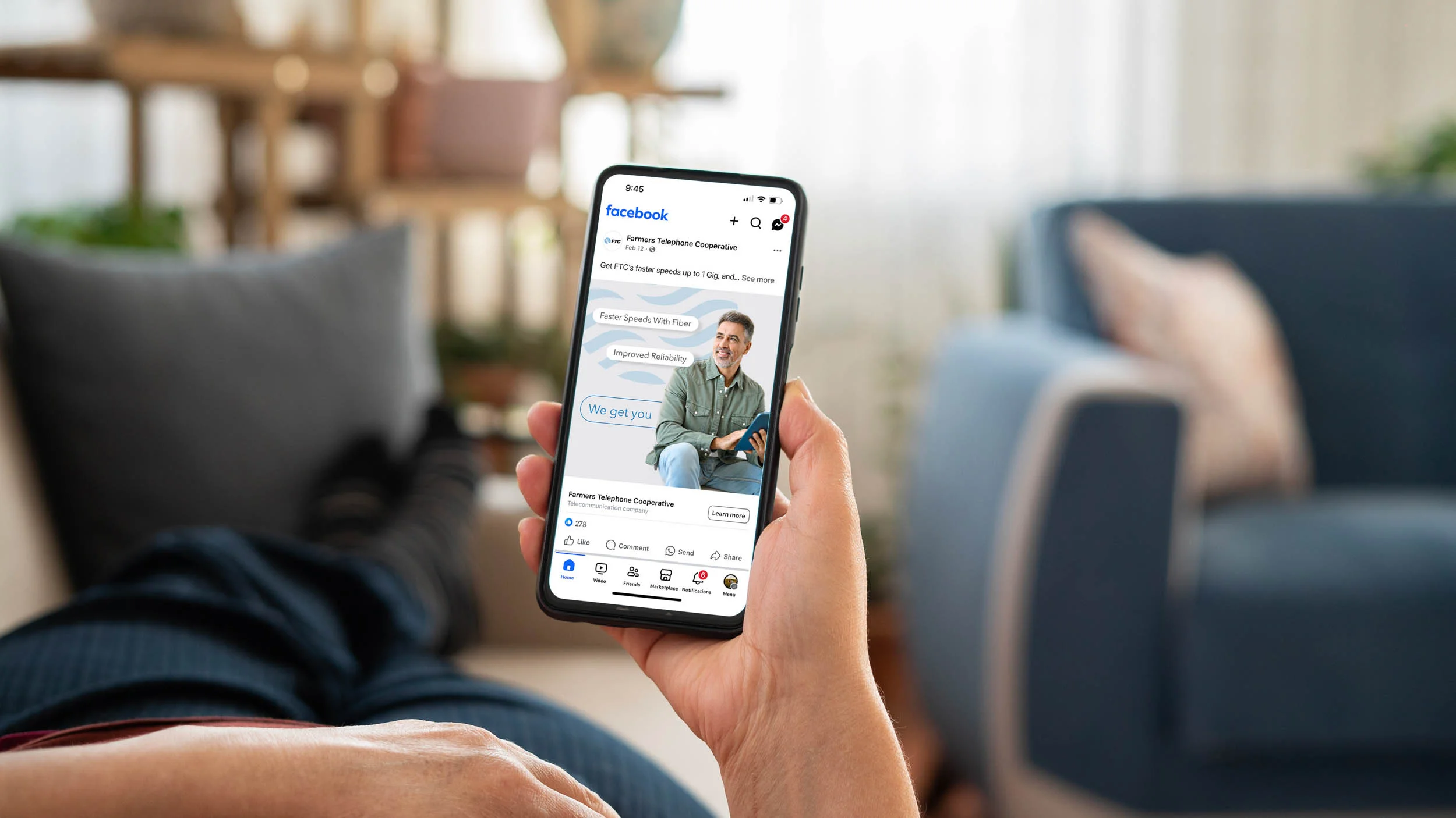 hand holding phone with ftc ad