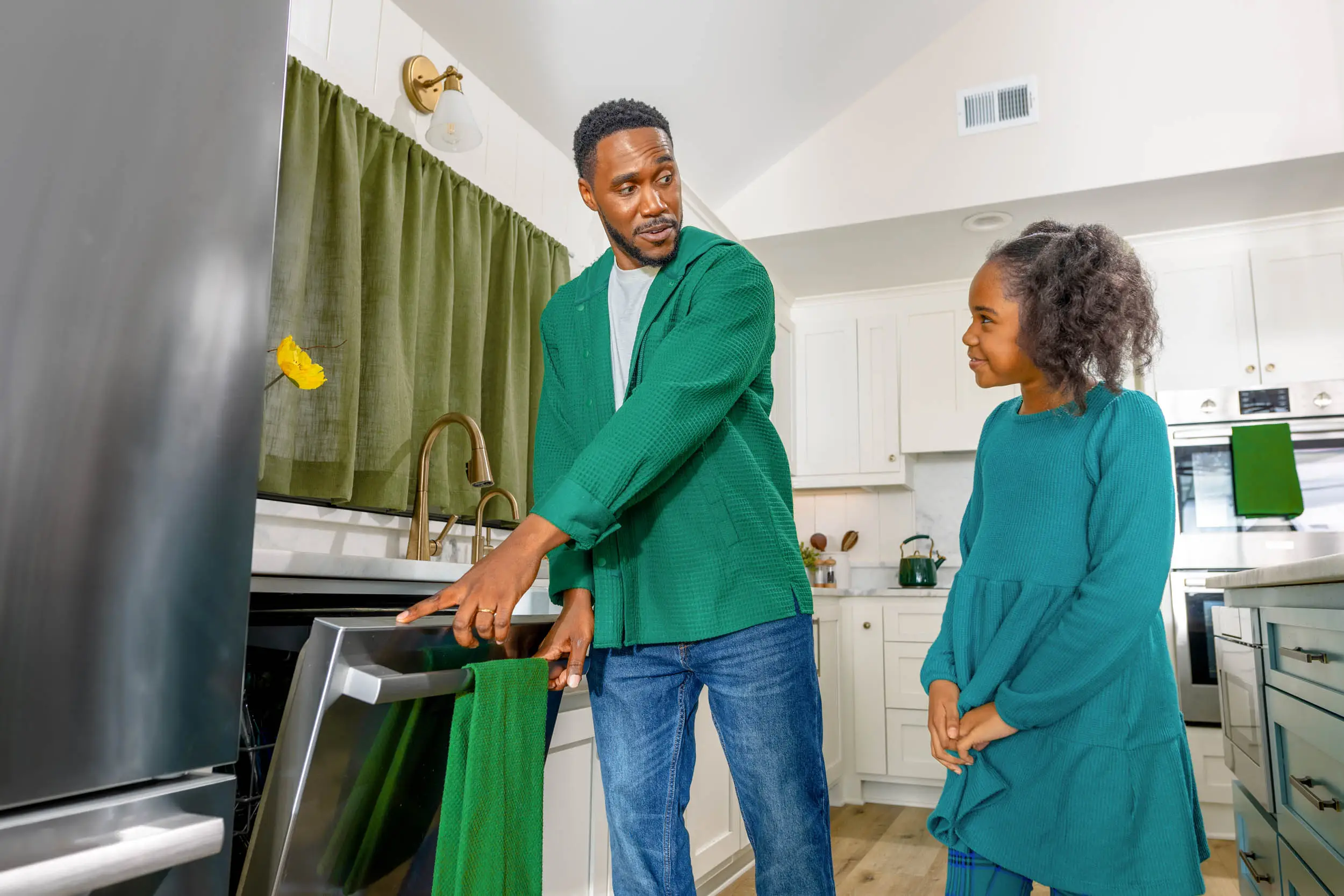 dad and daughter at dishwasher