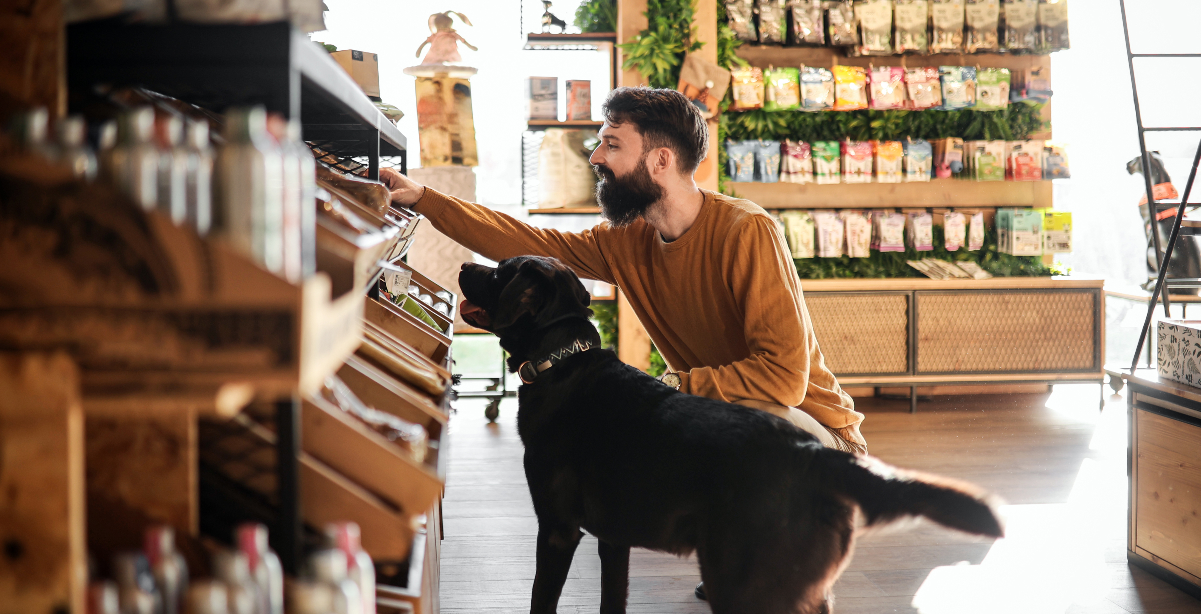 Man and dog in store