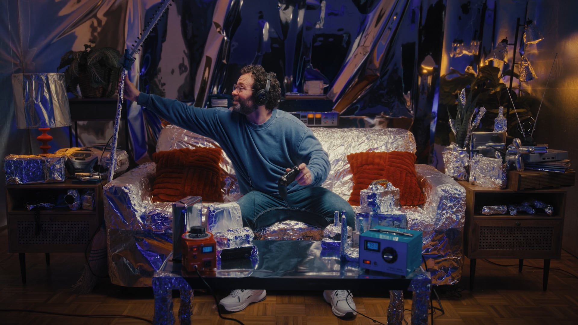 Man adjusting atenna