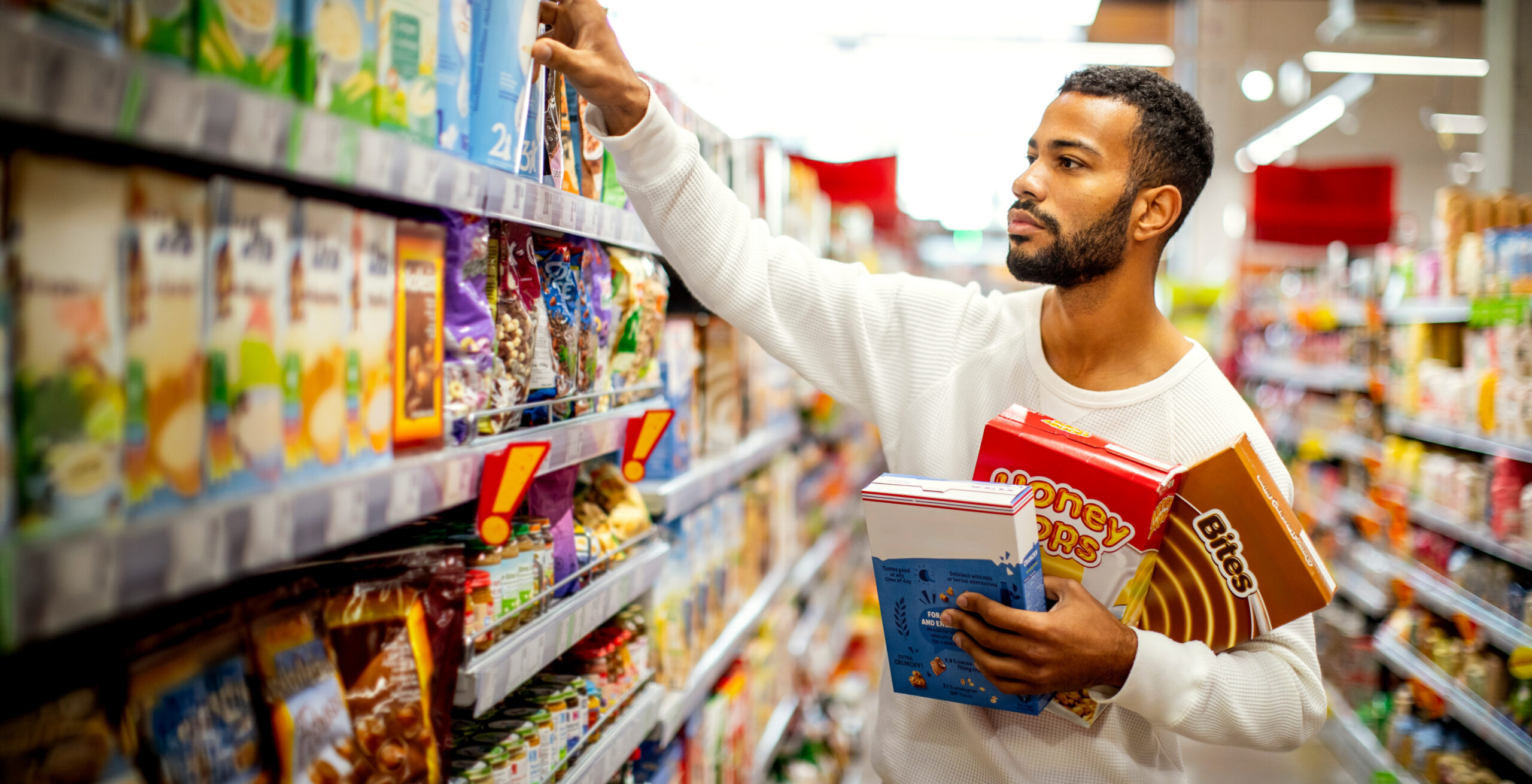 man shopping in grocery store