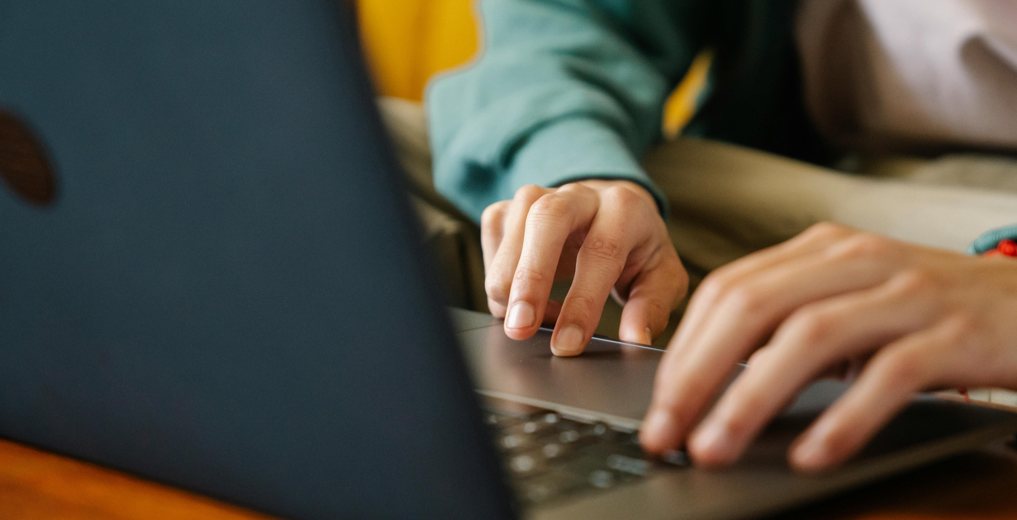 person typing on computer